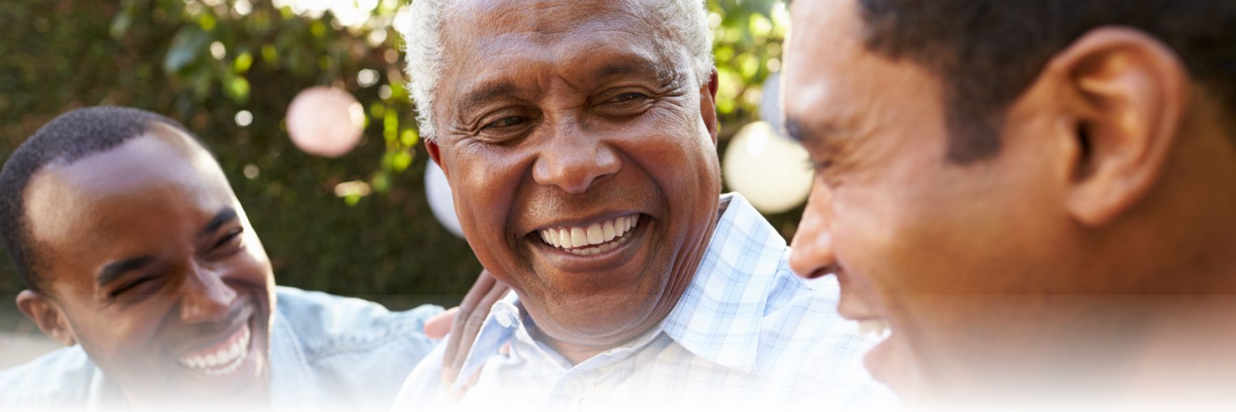Two African American Men with elderly father with dementia 