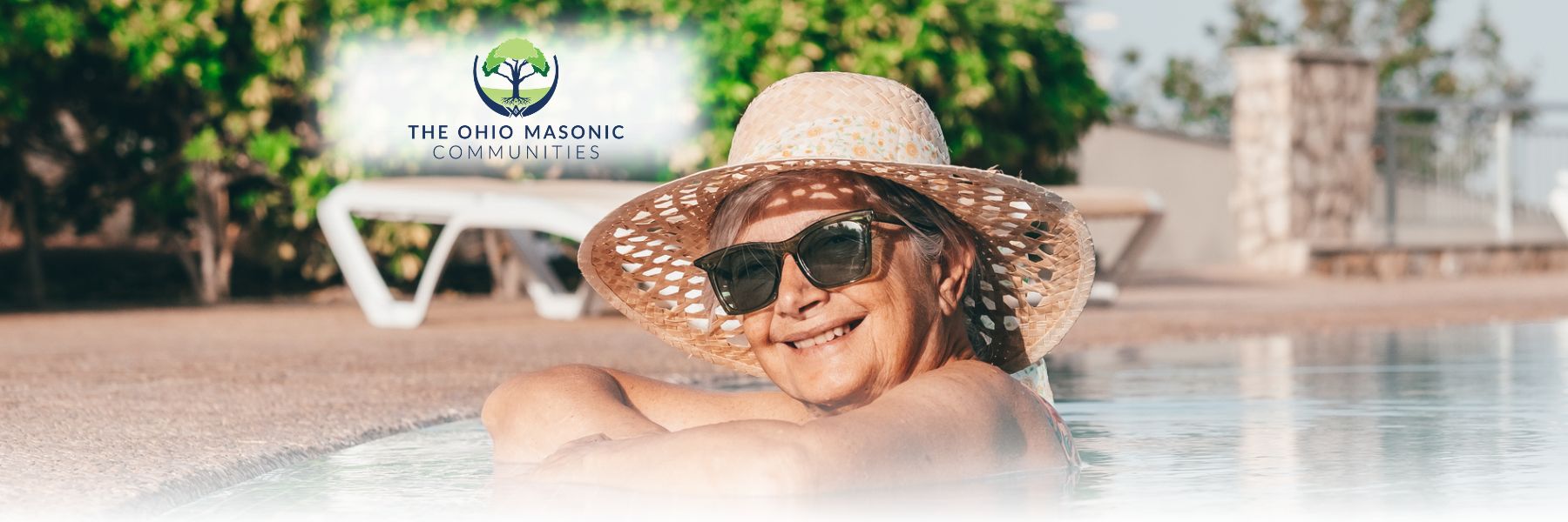 senior adult woman on tropical vacation lounging in the poo