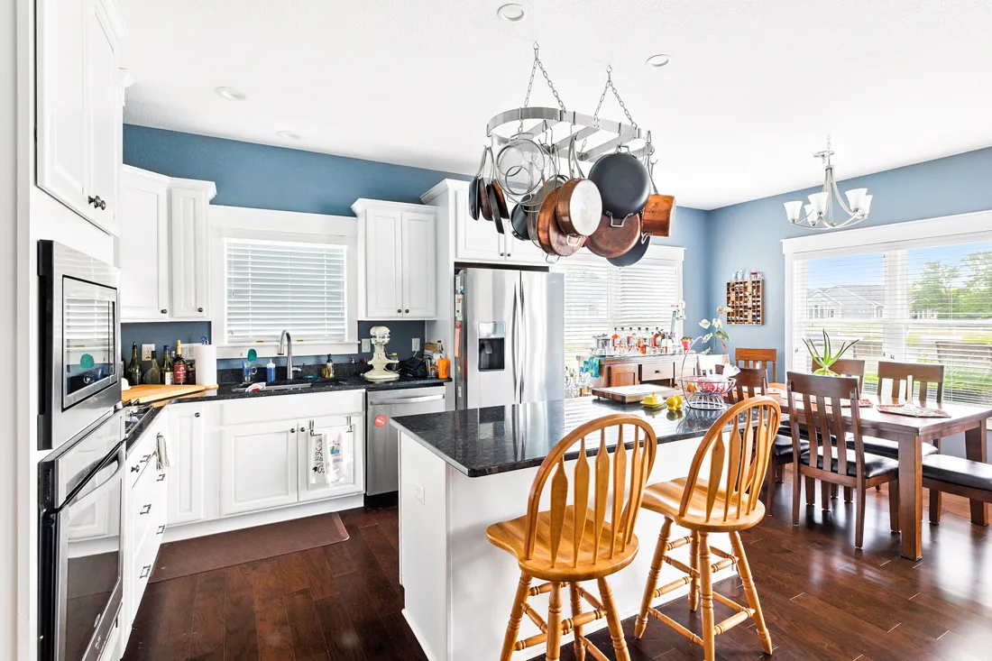 Large independent living residence kitchen with adjacent dining room