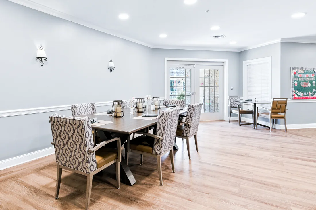 Memory support family-style dining table and chairs