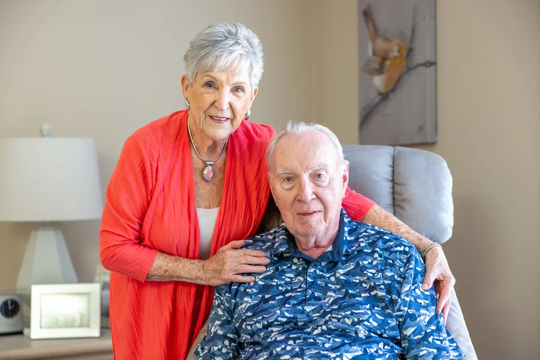 Older adult male and female couple smiling