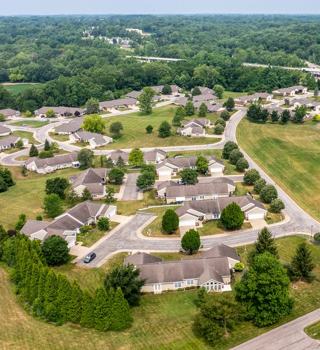 Aerial view of independent living villas with garages