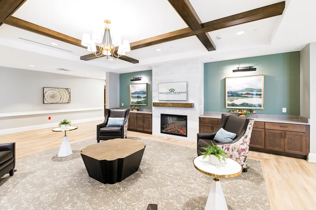 Living room with chairs and a fireplace