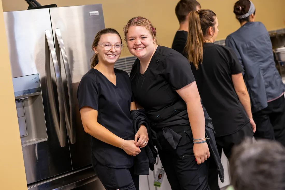 Team members gather together for an employee event