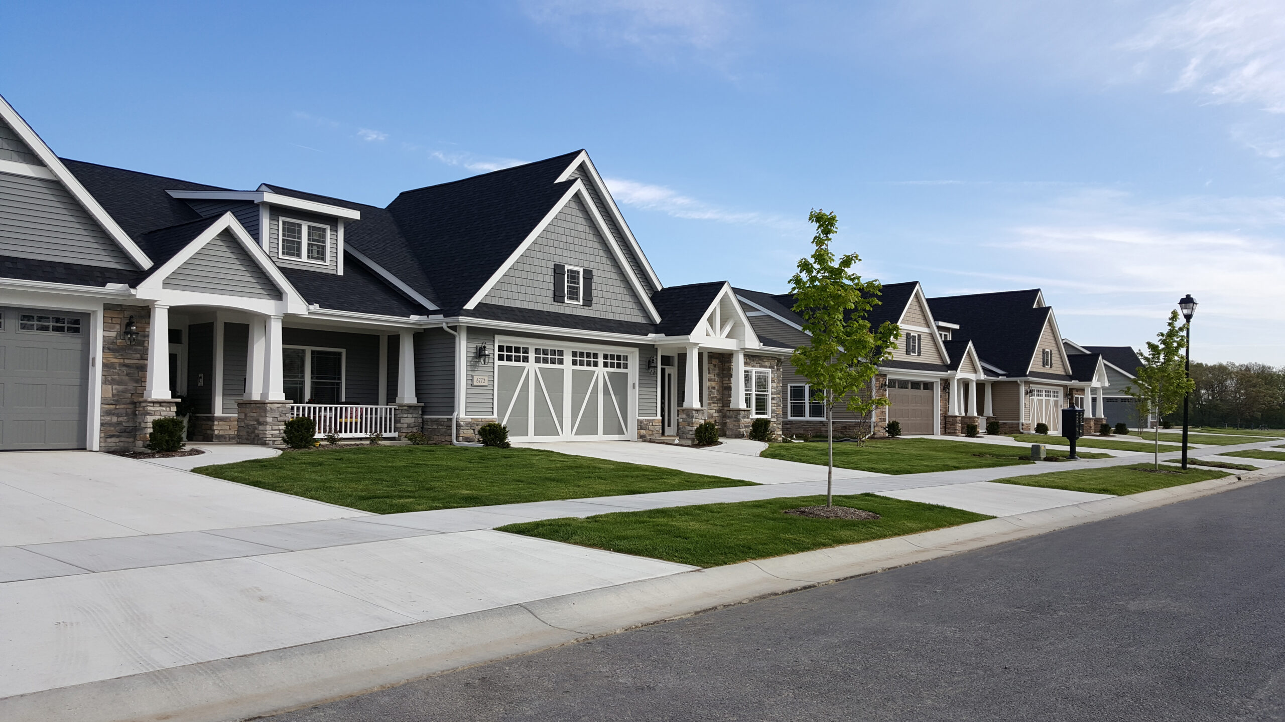 Street view of senior living villas and driveways