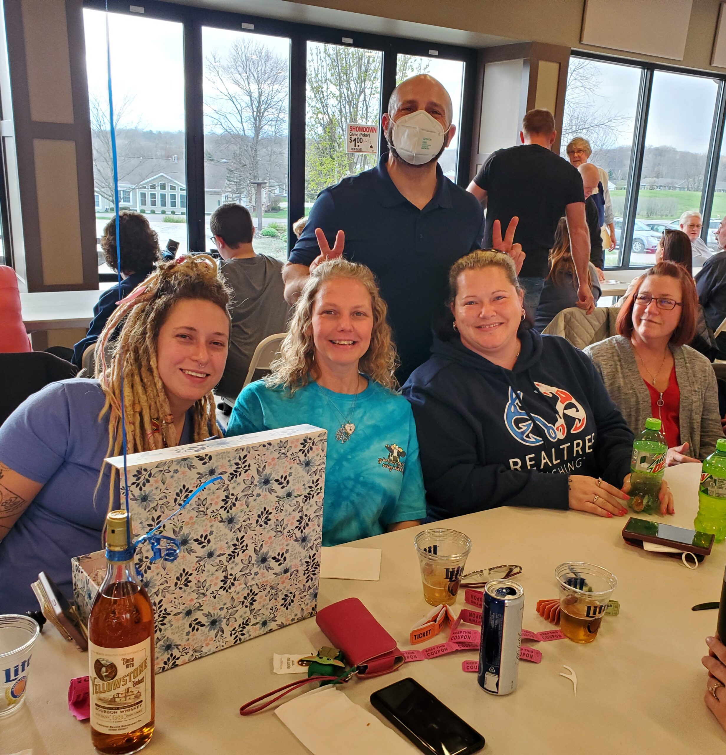 Team members attend community fish fry