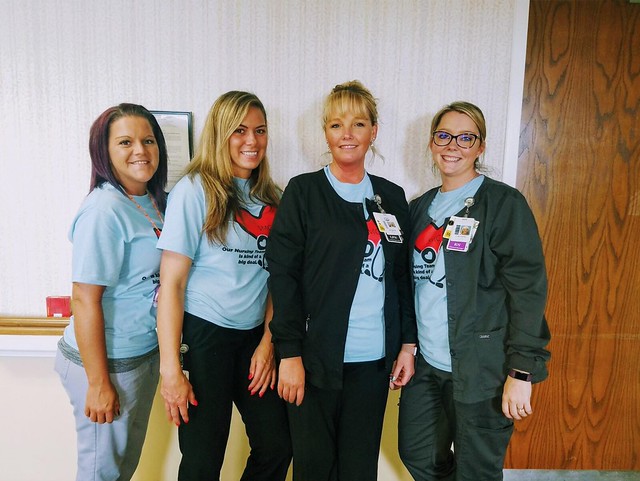 Team members wearing matching shirts