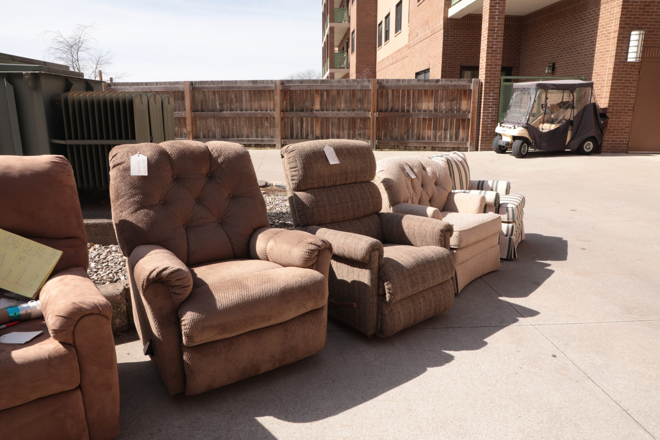 Furniture spread outside near building
