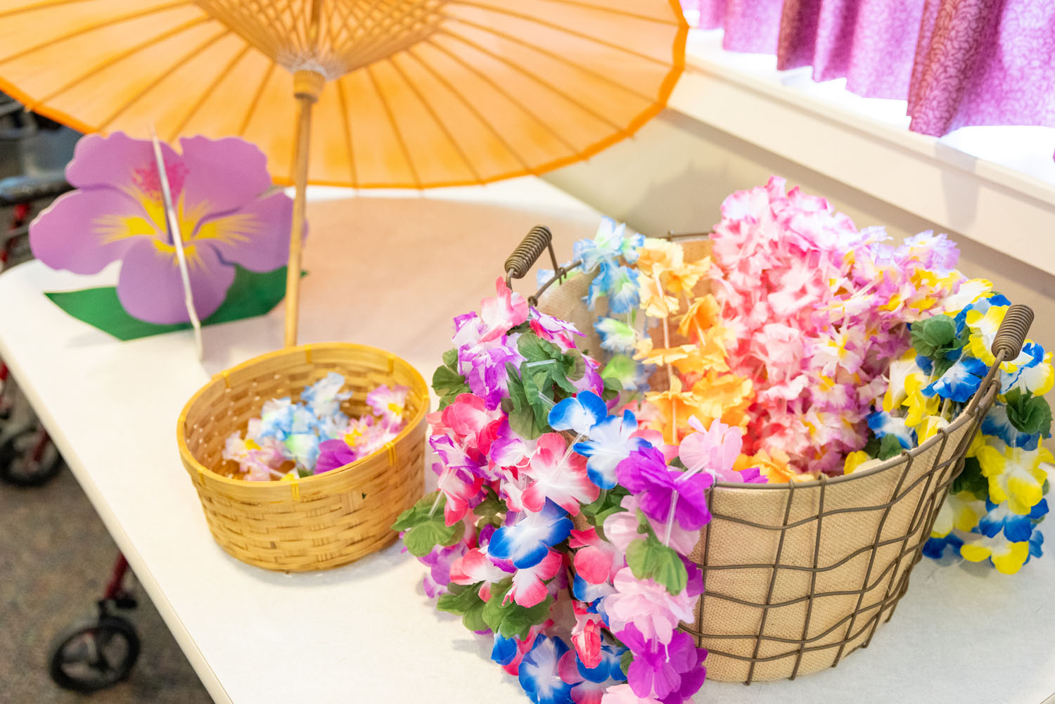Close up view of baskets of floral leis