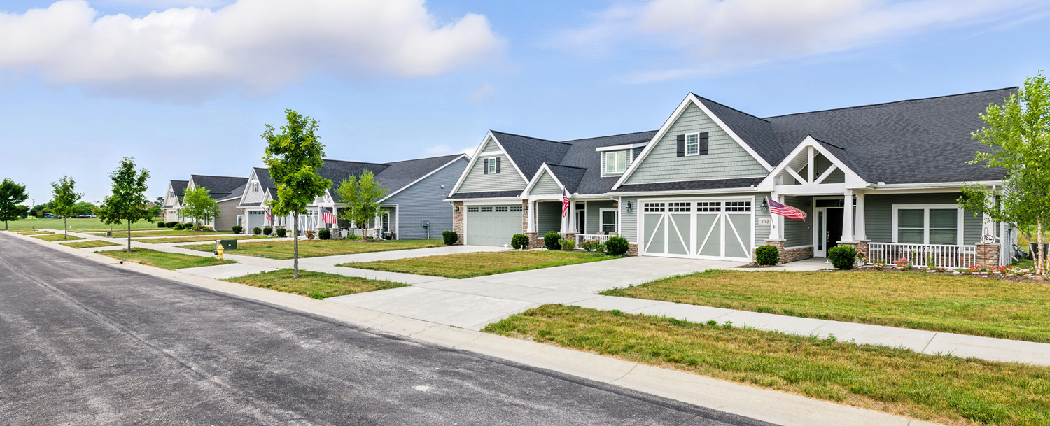 Street view of senior living villas and driveways