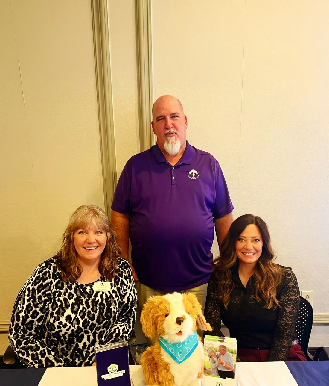Ohio Masonic Communities team members seated at a marketing table