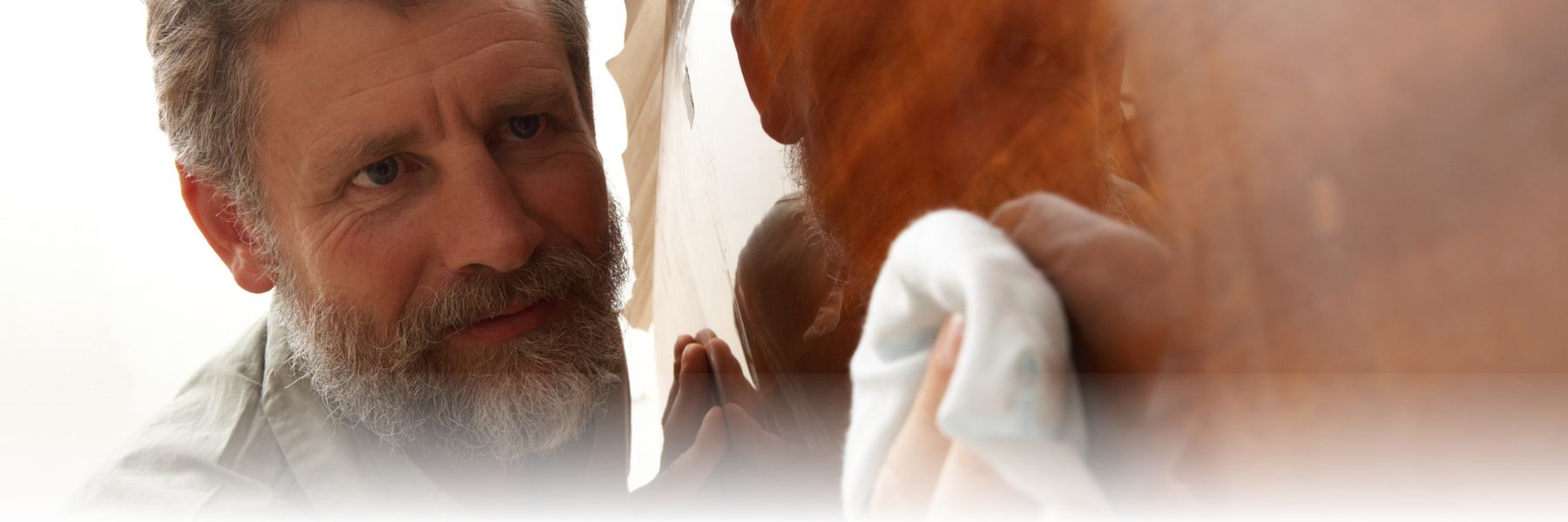 avoiding caregiver burnout: a man cleans as he takes time for himself