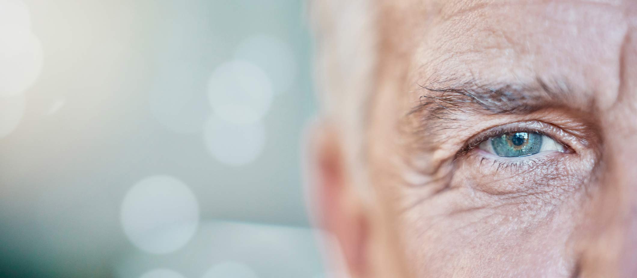 Older adult male close-up of his eye