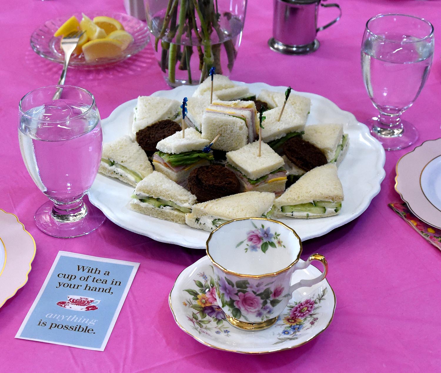 Close up view of sample sandwiches and tea cup