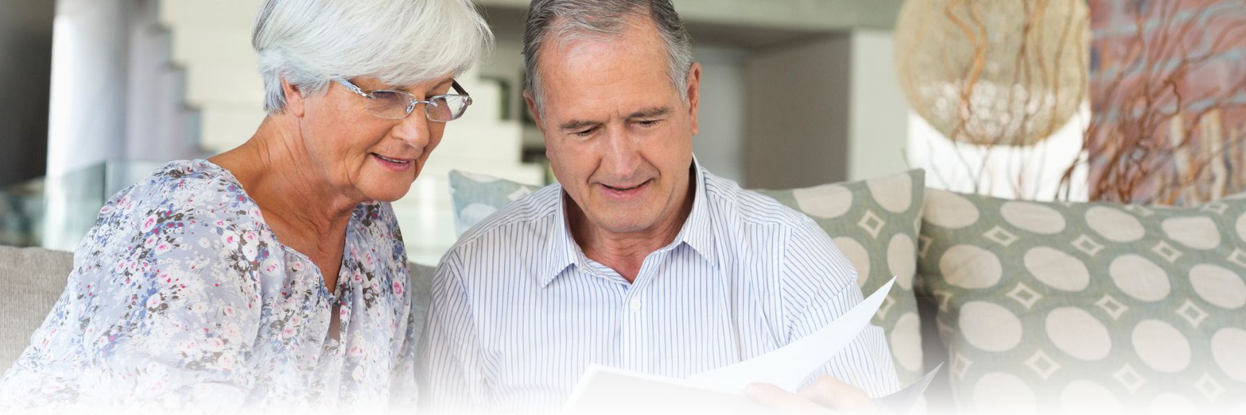 Older adult couple reviewing finances
