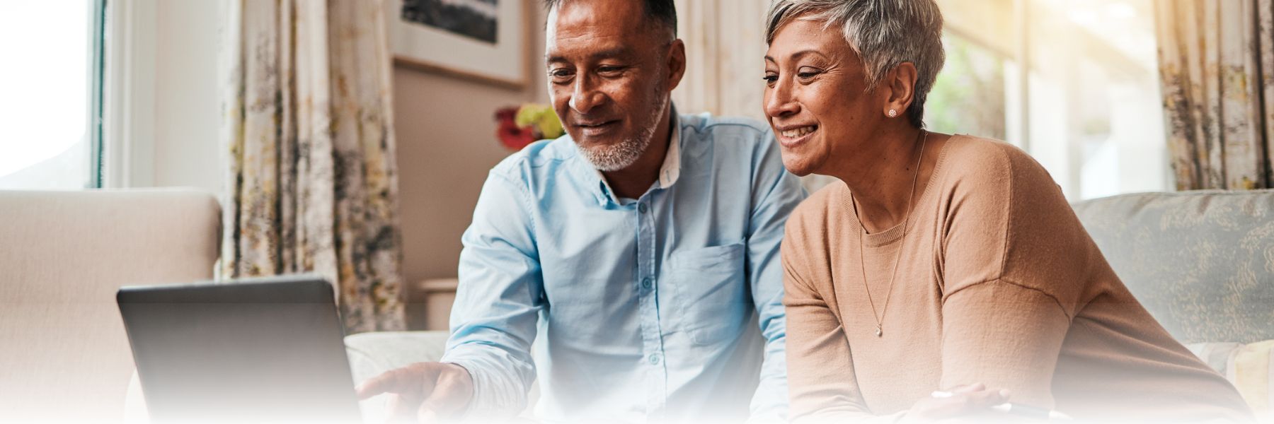Younger adult couple planning early for retirement