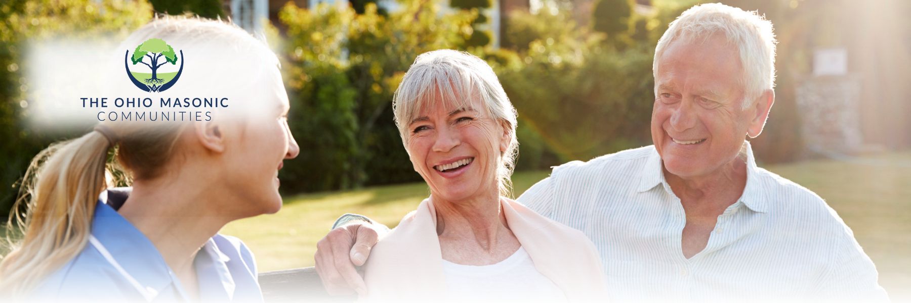 Senior Living 101 - two older adult women laugh with an older adult man
