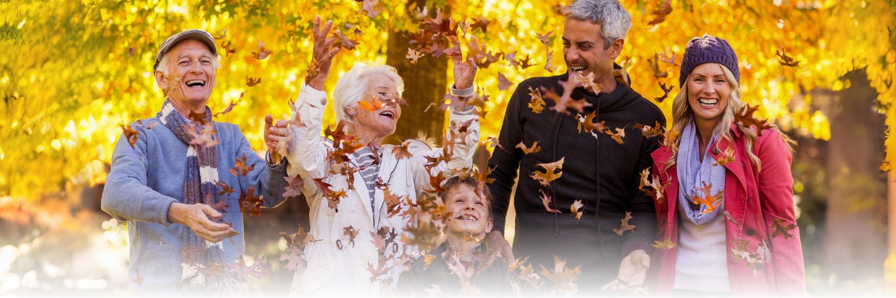 Family enjoying family-friendly fall activities like the leaves changing colors