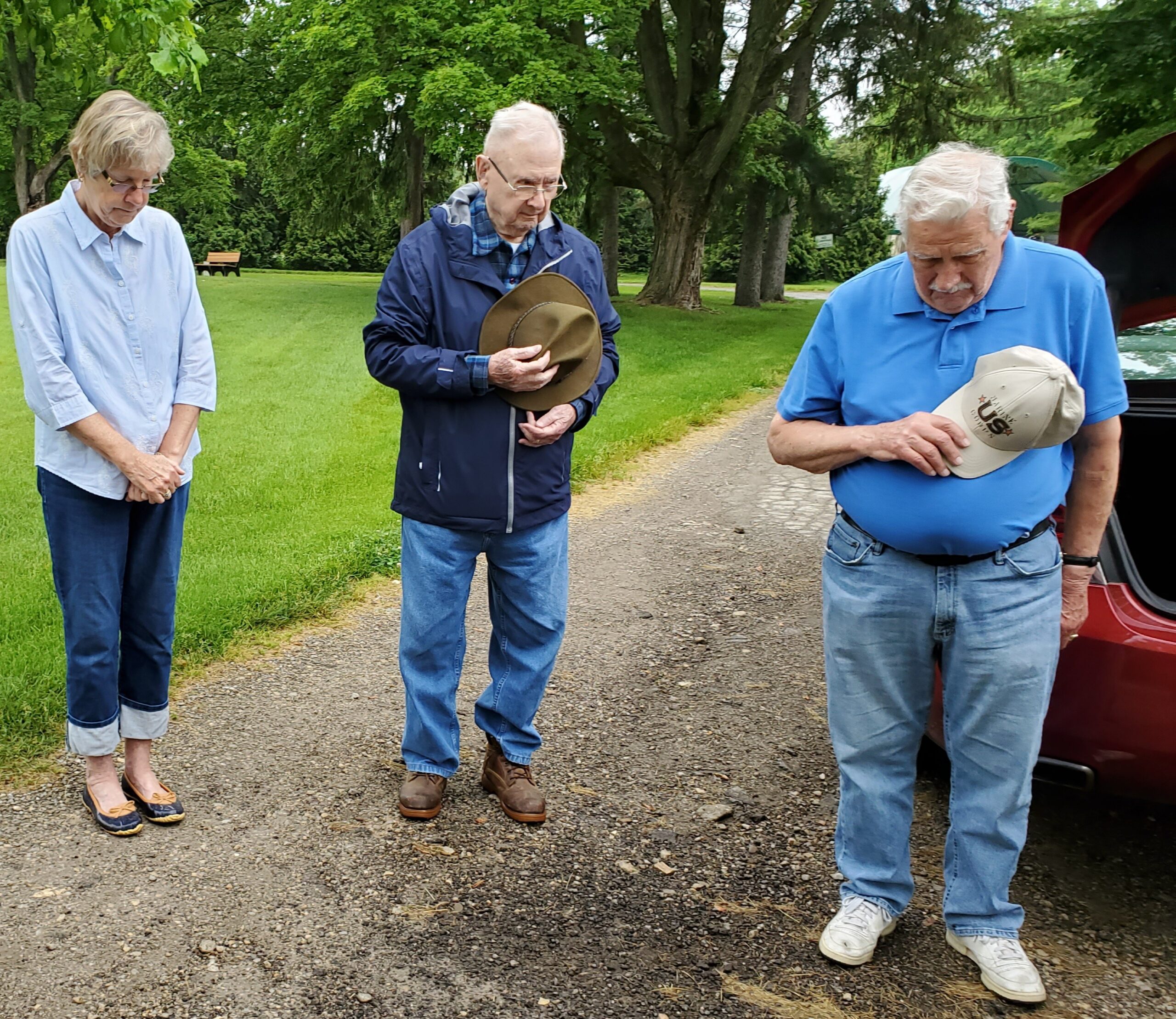 Residents bow their heads on Memorial Day