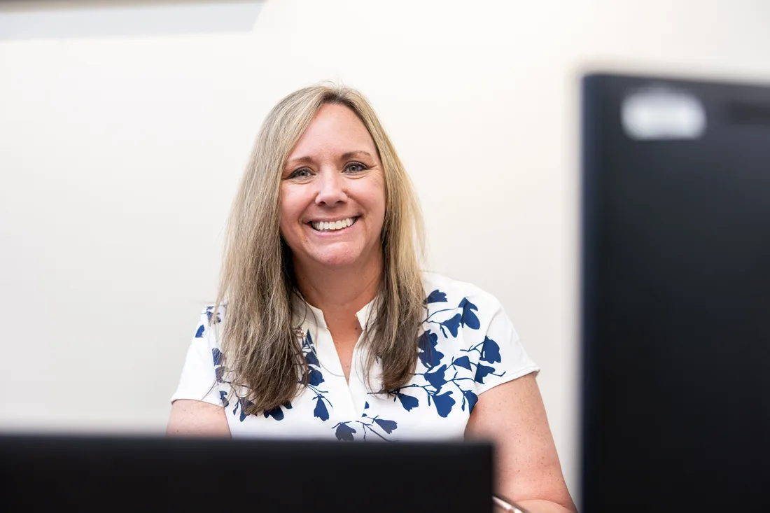 Team member smiling