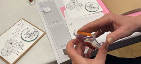 Older adult making handmade cards