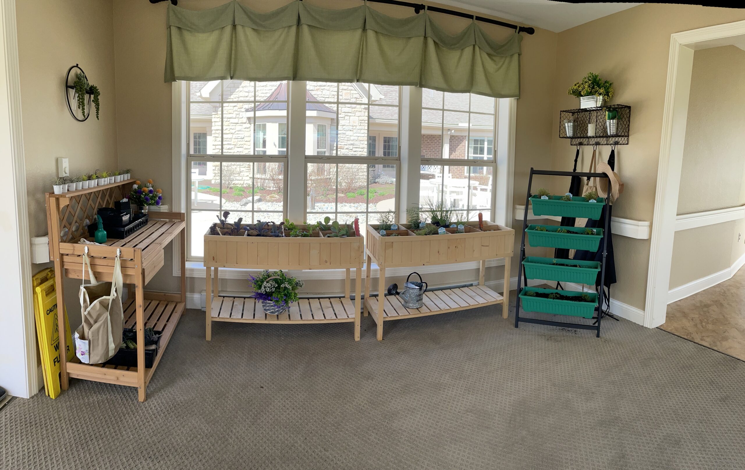 Room set up with gardening supplies and small plants