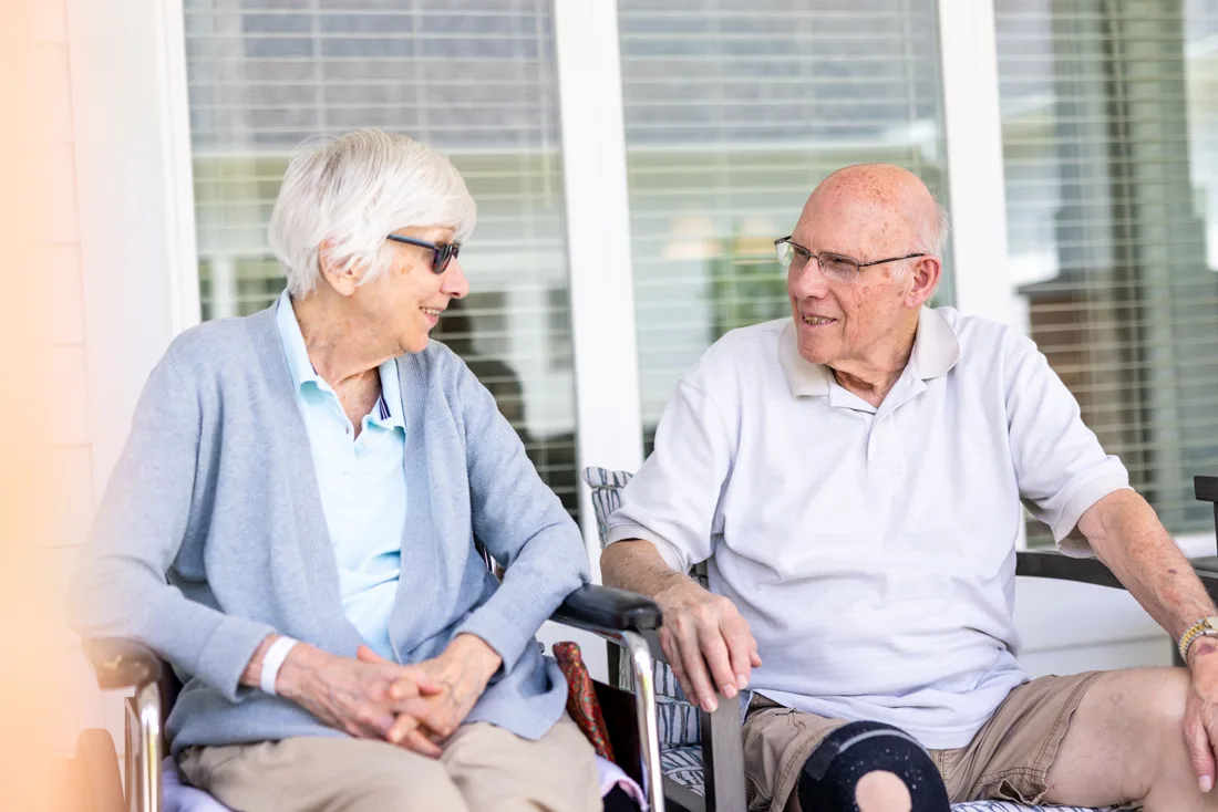Elder couple sitting on the porch