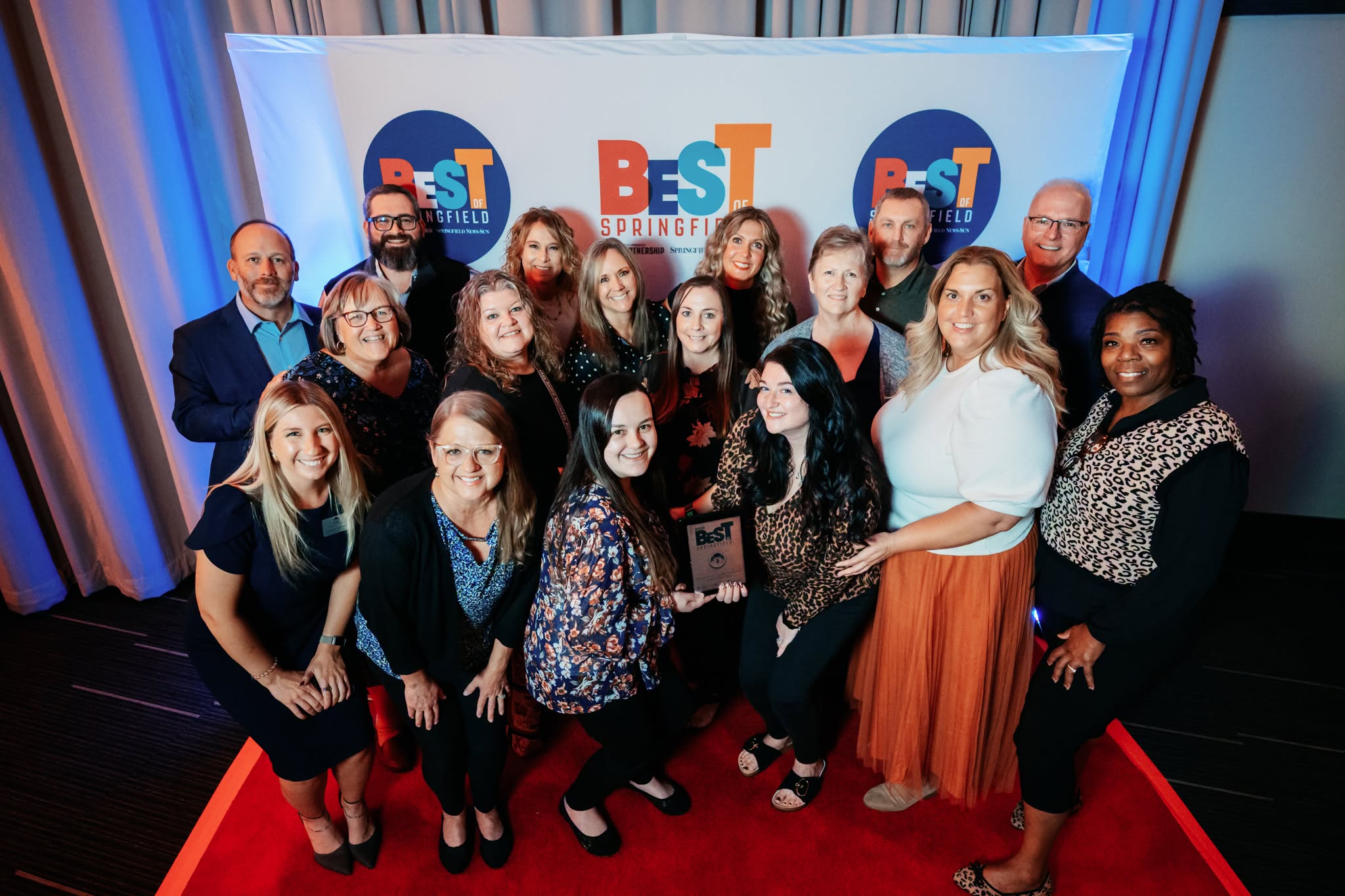 Group of people holding award for the Best of Springfield 2026 for award winning care